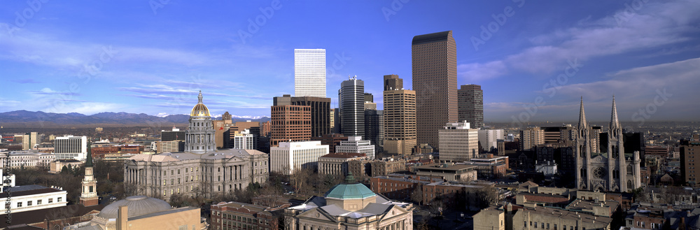 This is the skyline, State Capitol and Rocky Mountains. It shows morning light on what is known as the Mile High City. - obrazy, fototapety, plakaty 