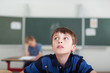 © contrastwerkstatt - nachdenklicher junge in der schule