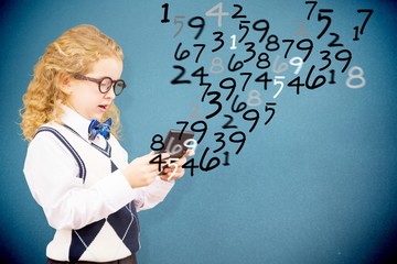 Sticker - Composite image of cute pupil with calculator