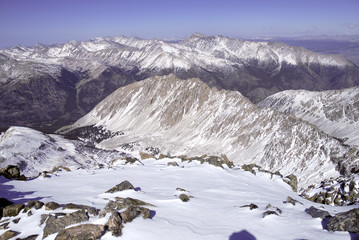Wall Mural - Snow capped mountain peaks in alpine scene after snow storm