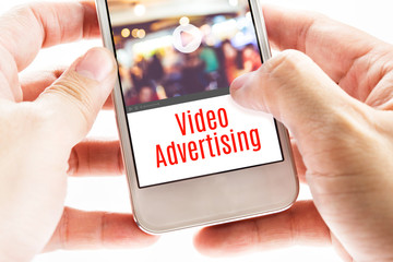 Aufkleber - Close up Two hand holding mobile with Video Advertising word, Di