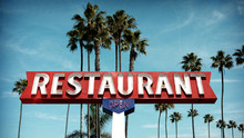 Aged And Worn Vintage Photo Of Neon Restaurant Sign With Palm Trees