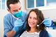 © Production Perig - Young attractive woman being cured by a dentist