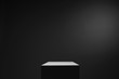 White cube box in dark space and background, light from top