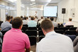 © Dmitry Vereshchagin - The audience listens to the acting in a conference hall