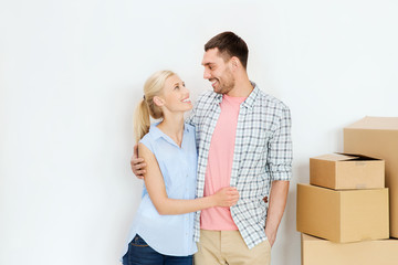 Poster - couple with cardboard boxes moving to new home