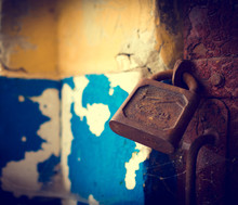 Old Rusty Lock On The Vintage Wooden Door