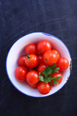 Wall Mural - Top view cherry tomatoes in bowl