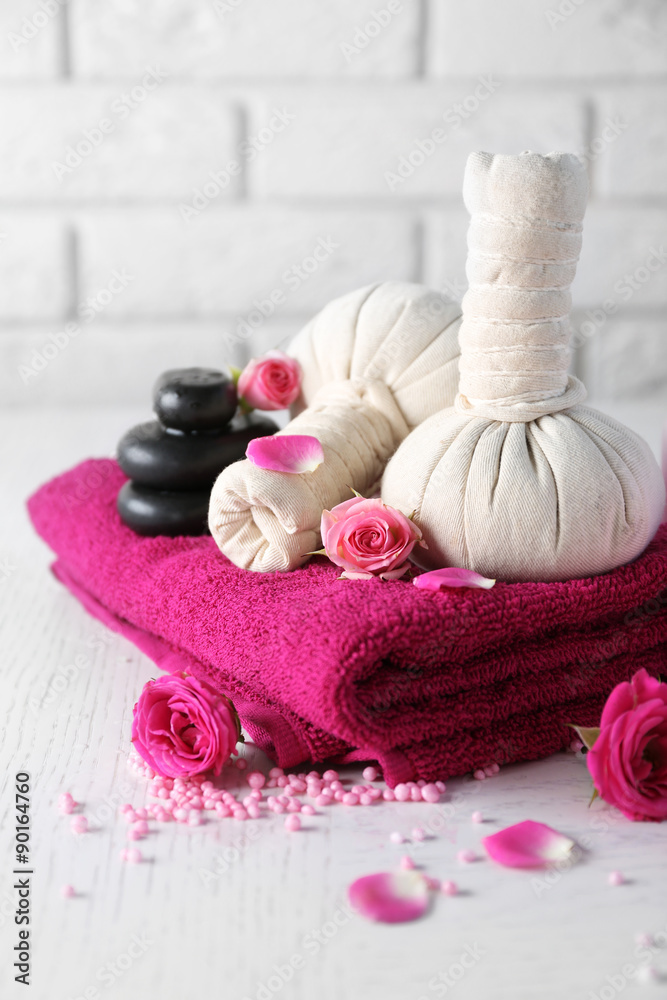 Beautiful composition of spa treatment on white wooden table