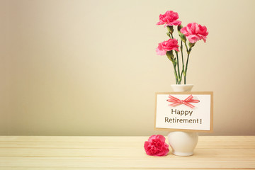 Wall Mural - Happy retirement message with pink carnations