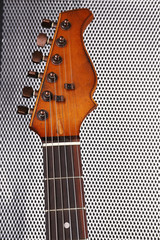 Poster - Guitar strings on metal grid background