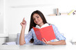 © Africa Studio - Young girl with book in room