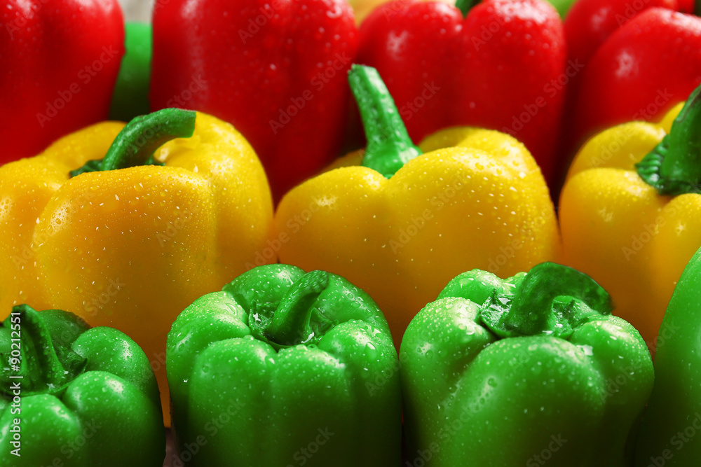 Group of wet colorful peppers, closeup