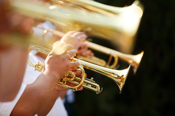 Pipes in the hands of musicians