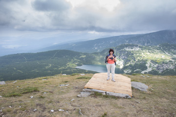 Senior women in a mountain top