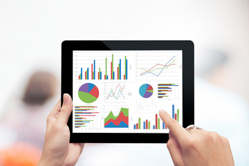 Poster - Close up hand holding digital tablet with analyzing graph,planing,business success