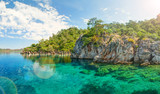 Fototapeta Boho - panorama of blue lagoon brightly lit with sinlight
