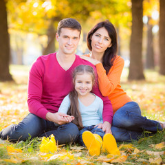 Sticker - Happy family in autumn park