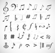 Music notes and signs hand-drawn in sketchy style