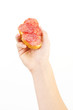 © Jaros - Right hand holding small snack with white bread and sausage, front view