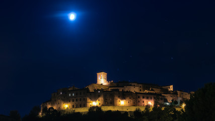 Wall Mural - Panorama  night with the moon of Anghiari medieval village in Tu