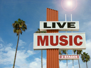 Wall Mural - aged and worn vintage photo of live music sign with palm trees and bright sun