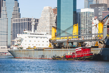 Wall Mural - Bulk carrier navigating on East river in New York.