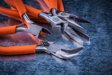 Composition Of Insulated Cutting Pliers Gripping Tongs With Rubb