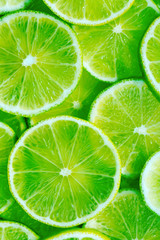 Wall Mural - close up of lime slices background
