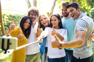 Sticker - Friends making selfie photo outdoors