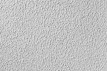 White wall with relief plaster pattern. Background