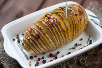 Sticker - Potato cut into slices almost right through and then baked