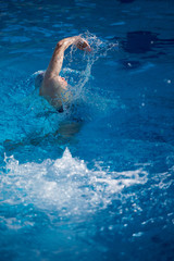 Wall Mural - swimmer excercise on indoor swimming poo