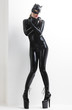 © Richard Semik - standing woman wearing latex clothes