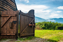 Rural Wooden Gate And Green Lawn