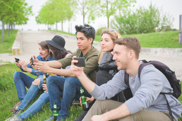 Wall Mural - Group of young multiethnic friends having fun