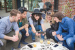 © Eugenio Marongiu - Group of young multiethnic friends having fun