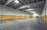 Fototapeta  - Empty industrial warehouse