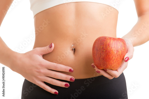 Plakat Kobieta trzyma jabłko