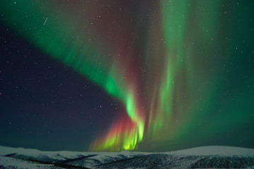 aurora borealis and meteors in alaska