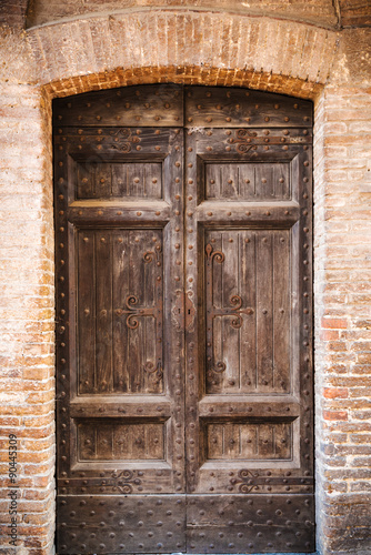 Naklejka ścienna Background door from iltalian streets in Tuscany