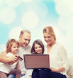 © Syda Productions - happy family with laptop computer and credit card