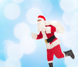 © Syda Productions - man in costume of santa claus with bag
