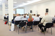 © Dmitry Vereshchagin - The audience listens to the acting in a conference hall