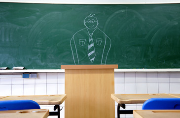 draw teacher on the blackboard in the classroom of school