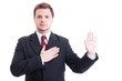 Young lawyer making oath or swearing gesture