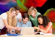 © vectorfusionart - Composite image of college students using laptop in library