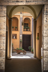 Wall Mural - Typical courtyard of house of the ancient village of Spello in Umbria