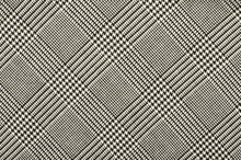 Black And White Houndstooth Pattern In Squares. Black And White Wool Twill Pattern. Woven Dogstooth Check Design As Background.
