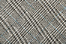 Black And White With Blue Houndstooth Pattern In Squares. Black And White Wool Twill Pattern. Woven Dogstooth Check Design As Background.
